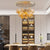 Interior lighting design with a large, statement gold chandelier.