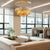 Contemporary chandelier with a unique, artistic design of metal monstera leaves.

