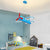 blue yellow airplane chandelier light.jpg